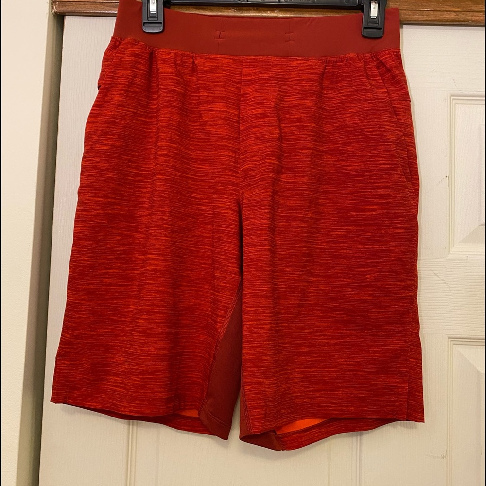 Lululemon T.H.E performance shorts. Burnt orange color. Size small